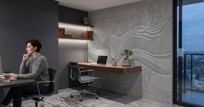 Szara fototapeta z falistymi liniami 3D w home office z biurkiem wiszącym i widokiem na miasto