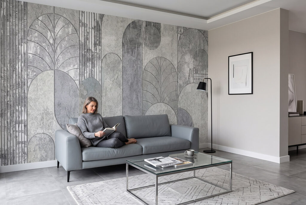 Fototapeta abstrakcja do salonu w stylu art deco, szare łuki i wachlarze za skórzaną sofą